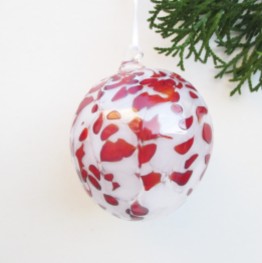 red and whtie spotted christmas blown glass ornament